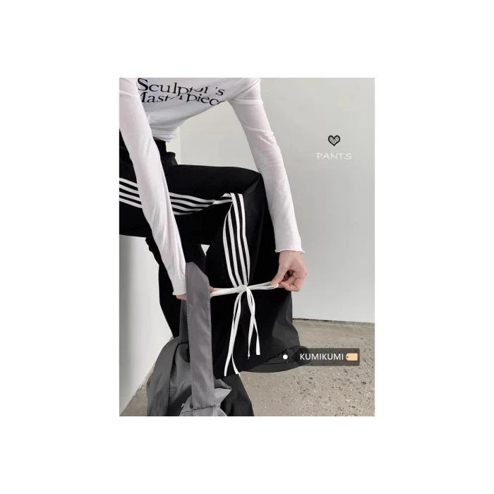 Pantalones deportivos negros de pierna ancha para mujer con diseño de lazo - Casual de principios de primavera, corte holgado