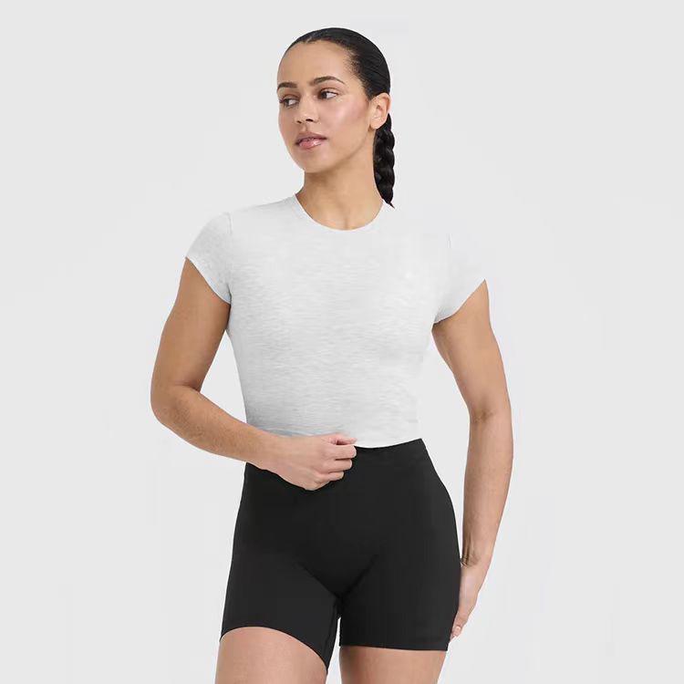 

Женская футболка для йоги в европейском и американском стиле - Высокоэластичная, Облегающая, Удобная, Повседневный спортивный топ, Короткий рукав Small светло-серый