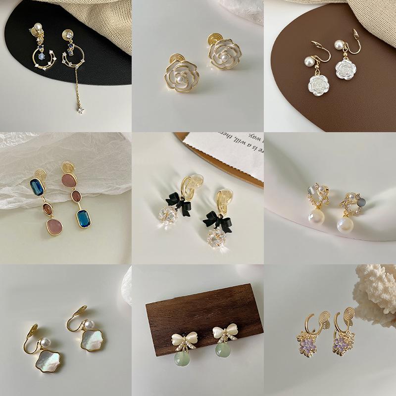 

French Retro Pearl Clip-On Earrings: Mosquito Coil Design, Hong Kong Niche Style, No Piercing Needed, Women s High-End Fashion Accessories.