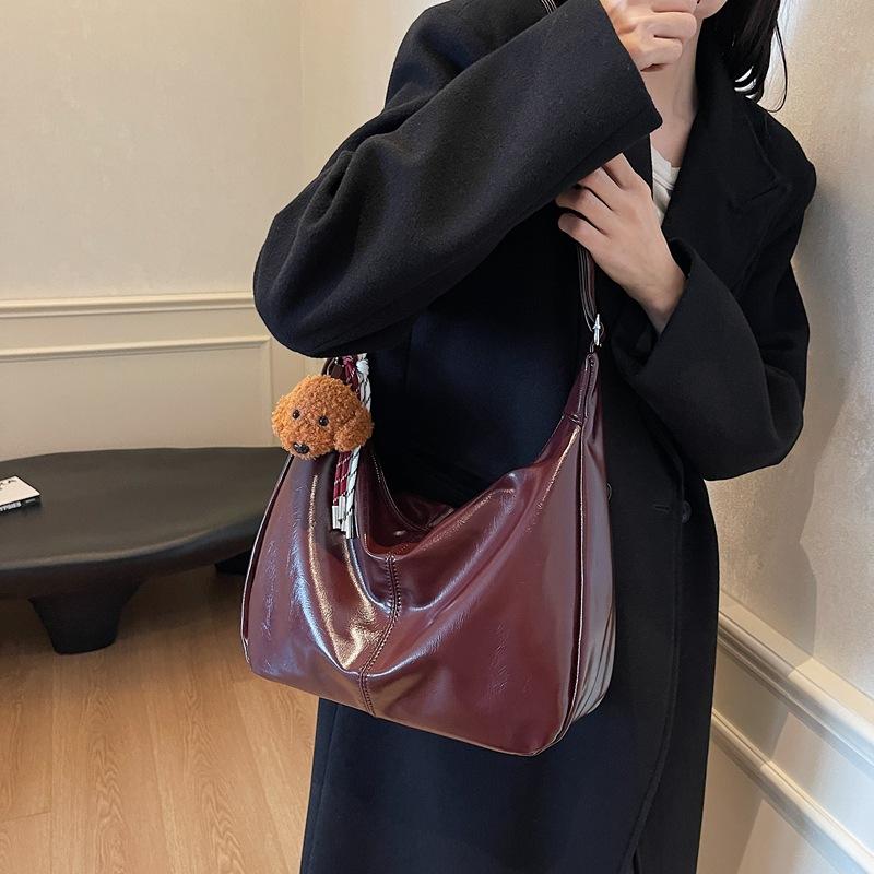 

Fashion oil wax leather casual bag women s 2025 new high-end commuter messenger bag large-capacity simple tote bag 35*11*29 бордовий