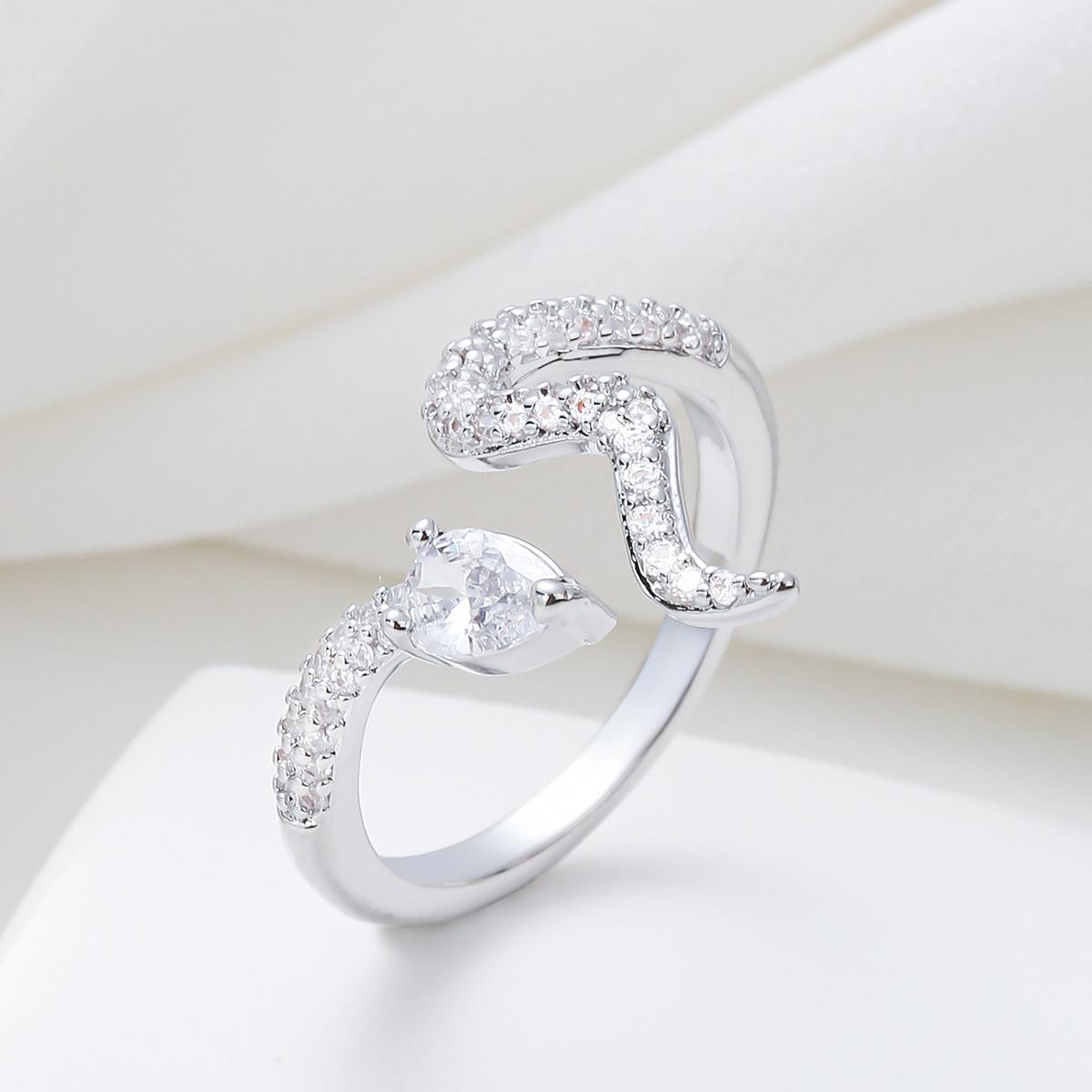 

Korean version of Xiaoqing Xinfeng women s ring, personalized winding snake inlaid zircon ring, opening adjustable index finger ring Opening adjustable