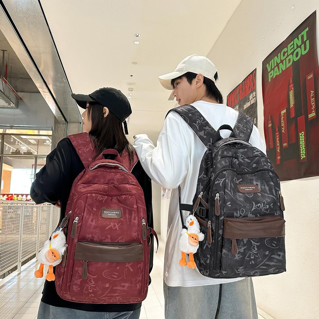Schoolbag new junior high school schoolbag women's printed backpack large capacity leisure light travel backpack schoolbag couple