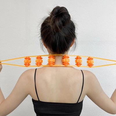 Ruční masážní přístroj na svaly zad, ramen a krku Plastový stahovák zad Fitness fyzioterapeutický masážní váleček Kuličkový stahovací váleček