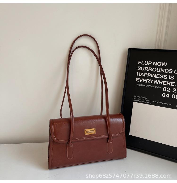 

Retro niche commuter armpit bag women s 2025 new trendy fashion shoulder bag simple and versatile tote bag коричневий
