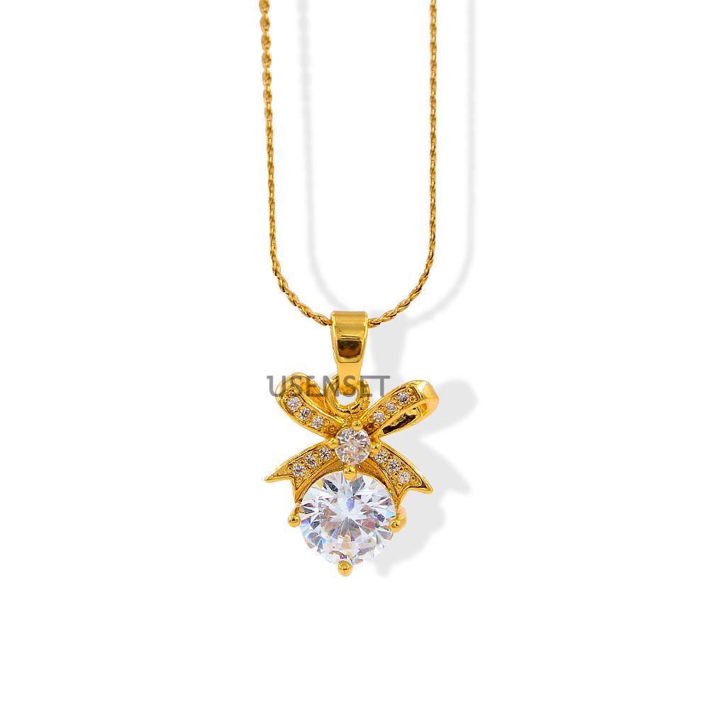 French Bow Pendant Necklace with Copper Micro-Paved Zirconia on Stainless Steel Water Wave Chain