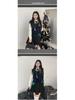 Niche Design College Style High-Waist Irregular Mini Skirt for Spring/Summer
