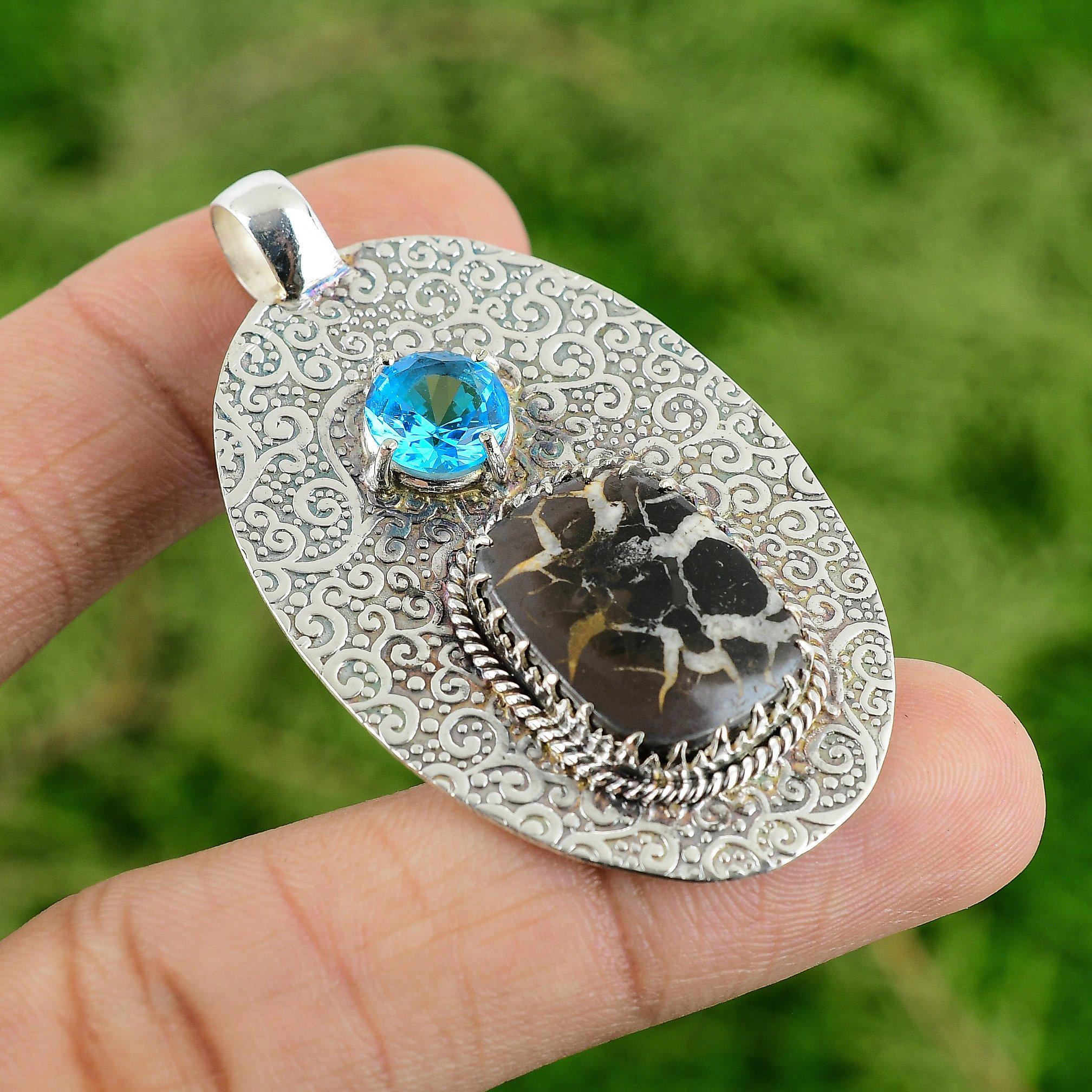 

Sterling Silver Moroccan Mud Crack Fossil Stone Swiss Blue Topaz Wedding Pendant
