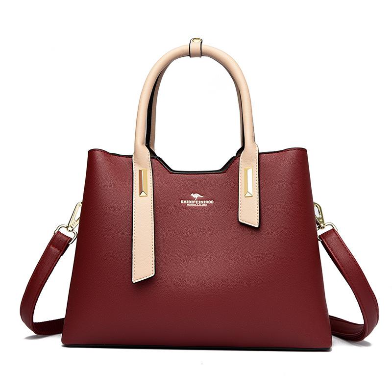 This Fashionable Color-blocking Bag Is Simple Elegant and Stylish for Ladies. It's A Hand-held Shoulder Bag