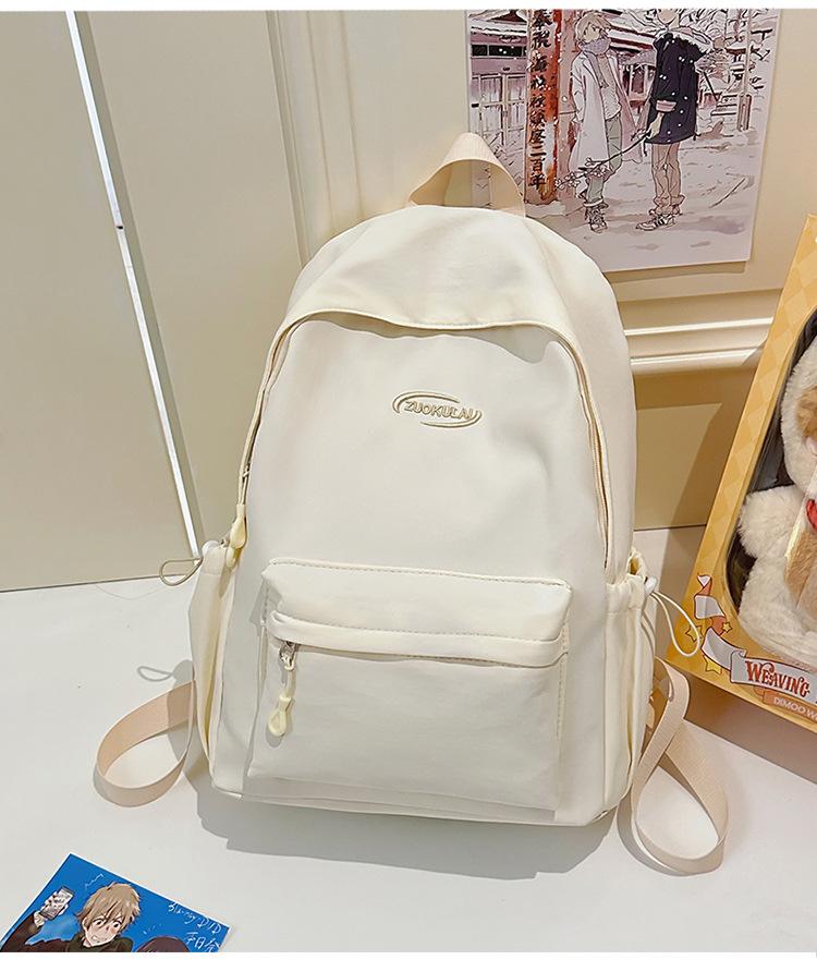 School bag 2025 new solid color ins wind backpack Korean version versatile high-value backpack simple large-capacity student school bag