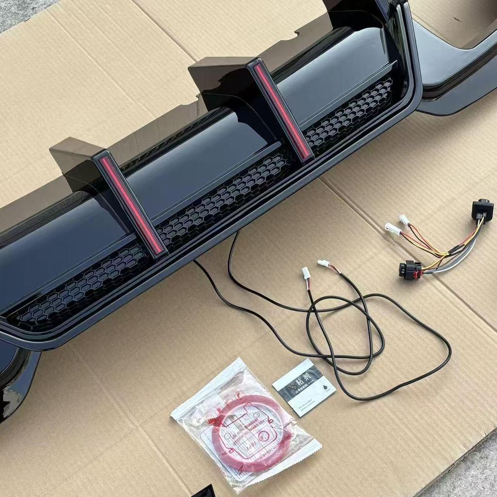 Fit for BMW 3 Series 20-22 G20/G28 Gloss Black Carbon Fiber Rear Diffuser with Dual Vertical Lights.