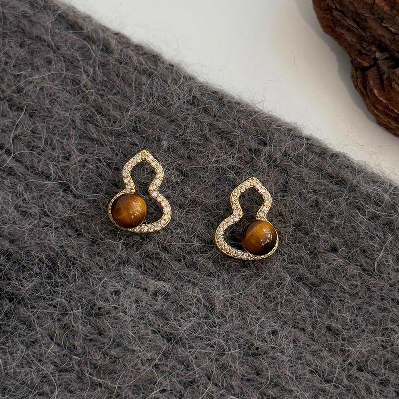 K real gold electroplated silver needle tiger's eye stone gourd stud earrings new Chinese temperament earrings niche design earrings women