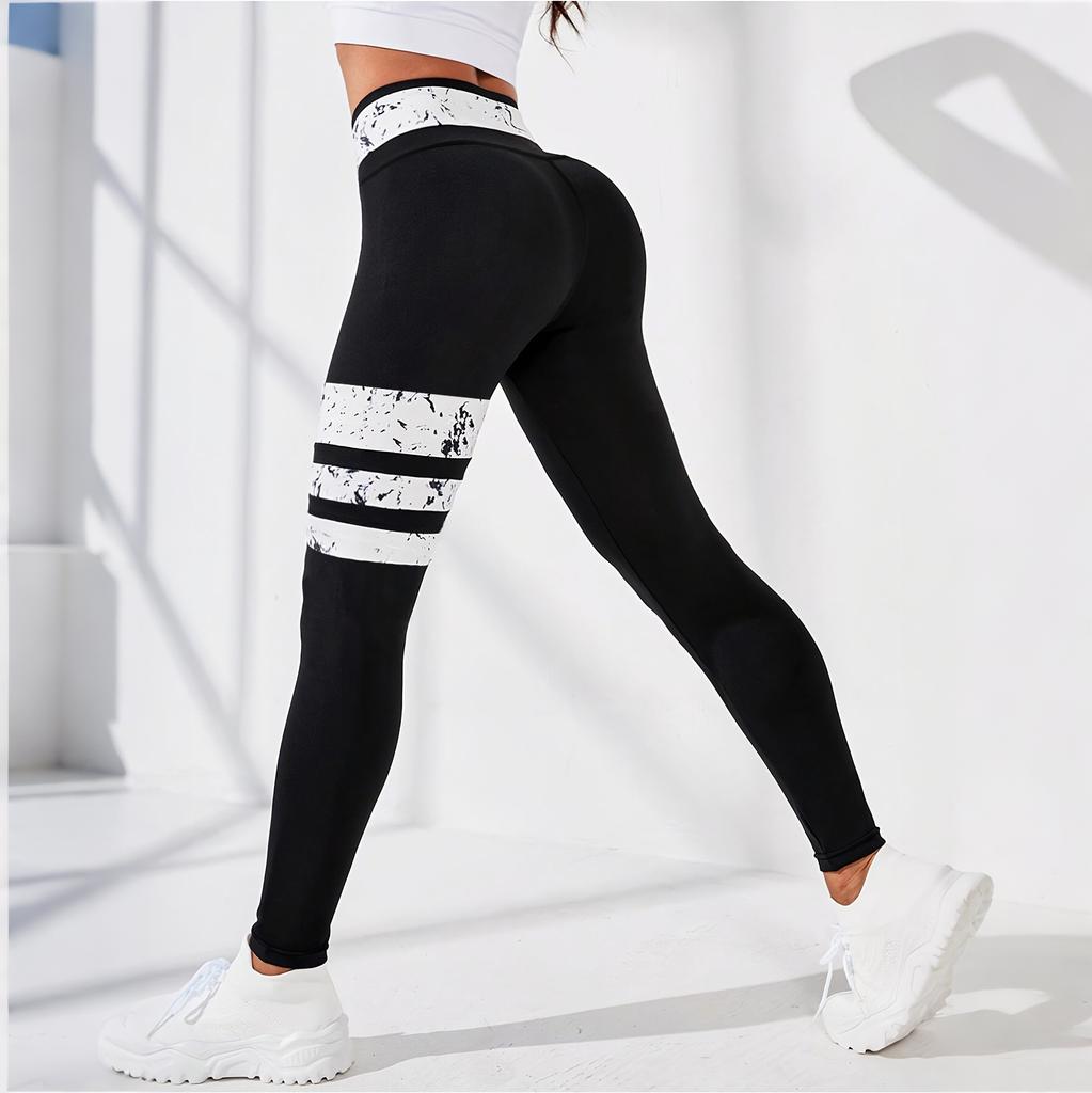 European and American women's clothing new cross-waist black and white contrasting colors casual yoga trousers high-waist hip-lifting elastic pants