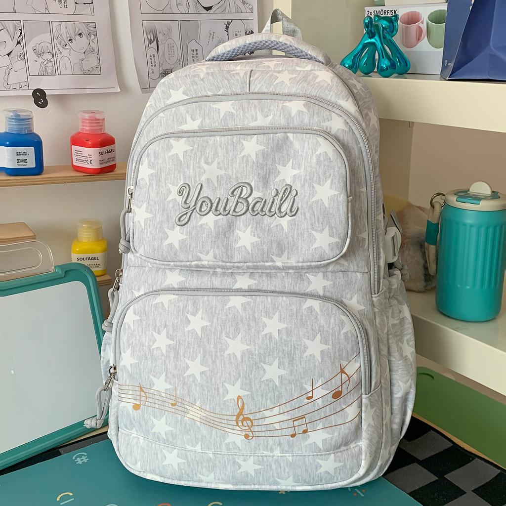 Schoolbag Oat Milk Card Star Galaxy School Bag Female Junior High School Student High Value Fashion College Wind Ridge Reduction Backpack