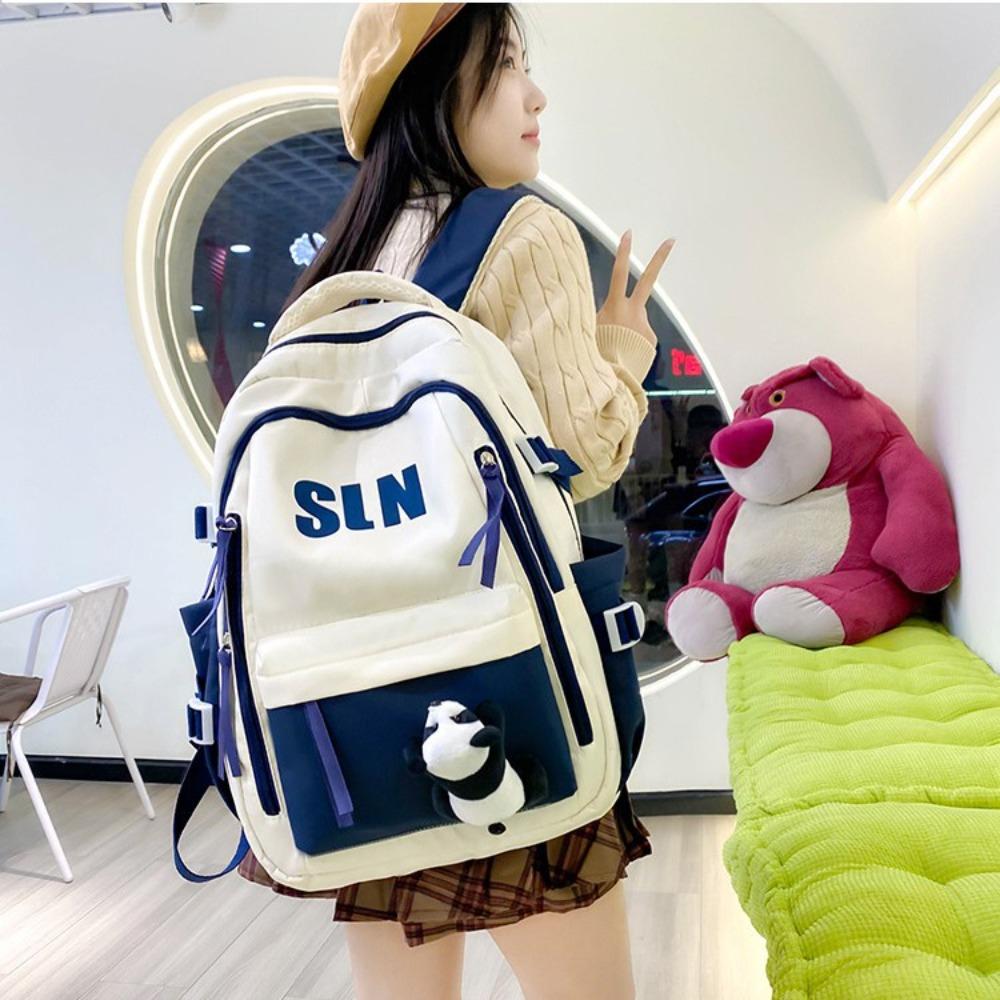 Large capacity ins wind backpack female junior high school high school student lightweight schoolbag computer backpack male trendy model