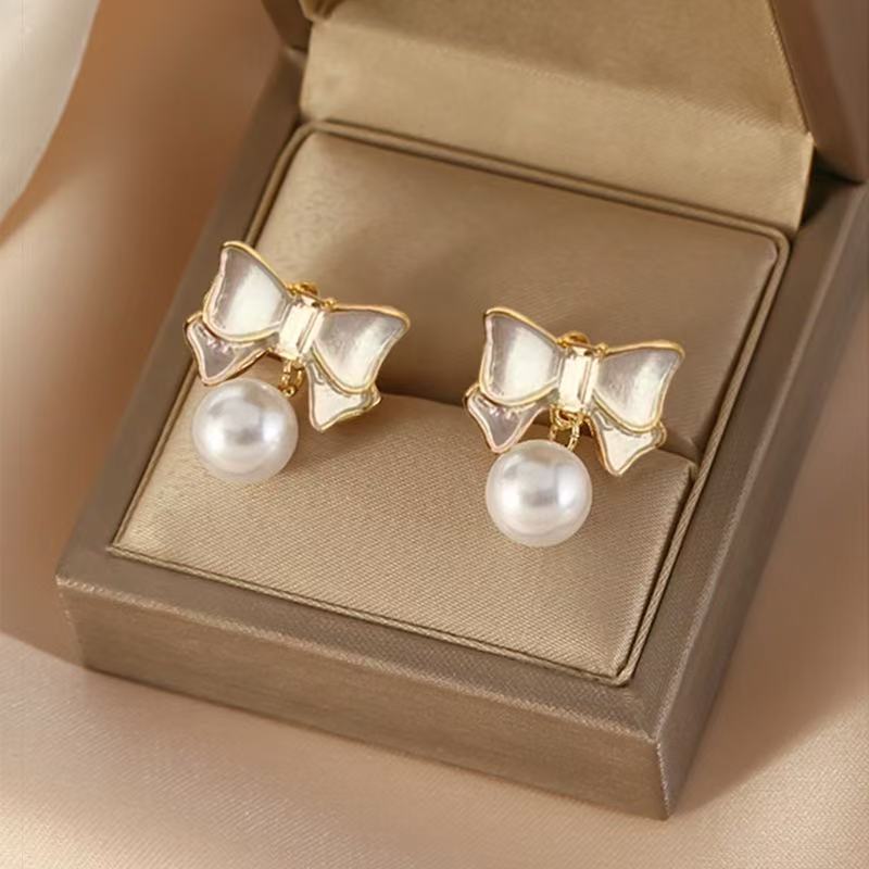 

S Silver Needle Korean Simple Bow Pearl Earrings Light Luxury High-end Niche Design Earrings Earrings Women білий