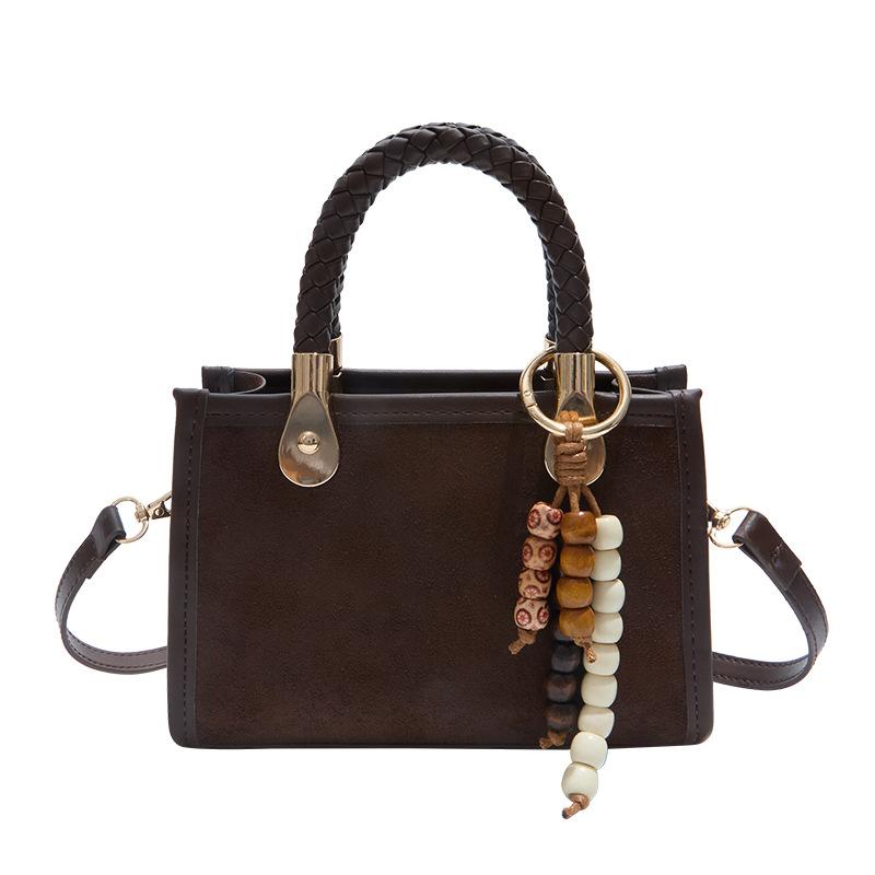 Niche design small bag female leopard print 2025 new Japanese and Korean fashion shoulder bag woven portable messenger small square bag