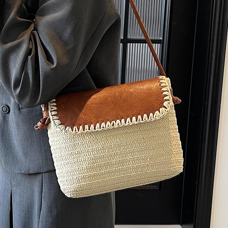 Spring and summer new Korean version ins wind straw woven bucket bag niche casual texture Mori holiday wind messenger bag women