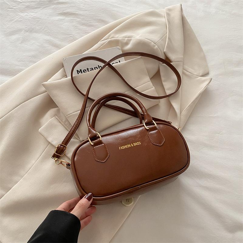Portable New Bowling Bag Women's 2025 Spring and Summer New Korean Version Fashion Shoulder Bag Simple Casual High Texture