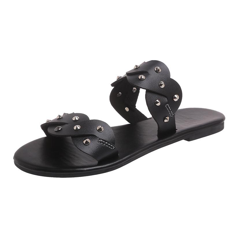 Foreign trade flat bottom one-word cool slippers women's new summer European and American rivet round head large size slippers