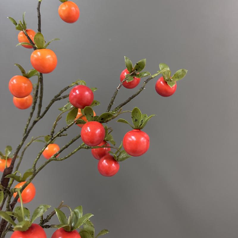 Konstgren med mini persimonblommor för heminredning