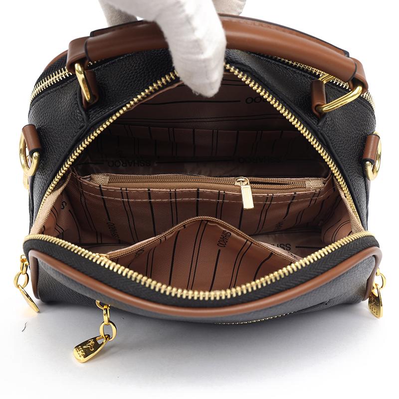 Women's PU leather top handle crossbody bag with multiple pockets, stylish contrasting color matching, and simple shoulder bag