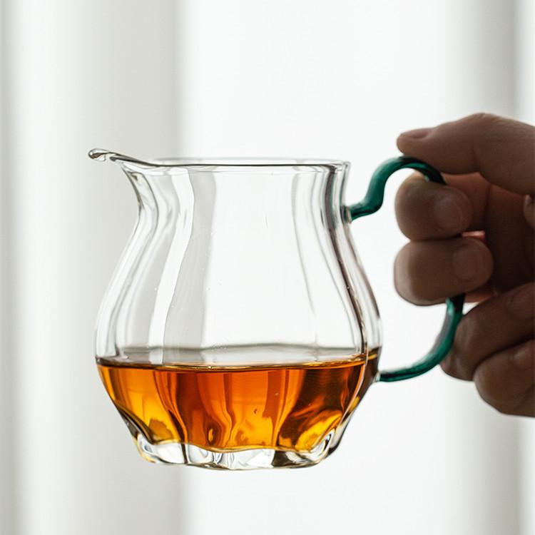 Szkło borokrzemowe Wysokie Krawędź melona Kolorowy uchwyt Czarka sprawiedliwości Salon z gośćmi Herbata Morze herbaty Dzielnik herbaty Spiczysty dzióbek Zielona herbata Czarka równości