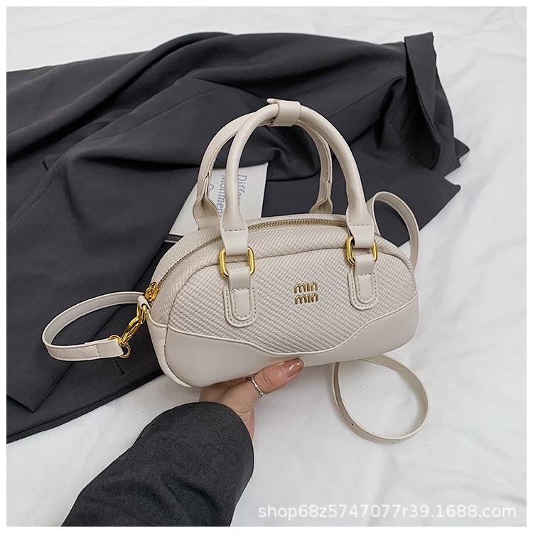 

This year s popular super hot portable bowling bag women s 2025 spring new high-end one-shoulder crossbody bag білий