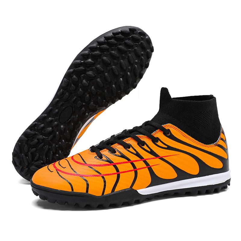 Zulassung von Übersee-Herren- und Damen-Erwachsenen-High-Top-atmungsaktiven Fußballschuhen Kunstrasen-Trainingsschuhen professionellen Wettkampfschuhen