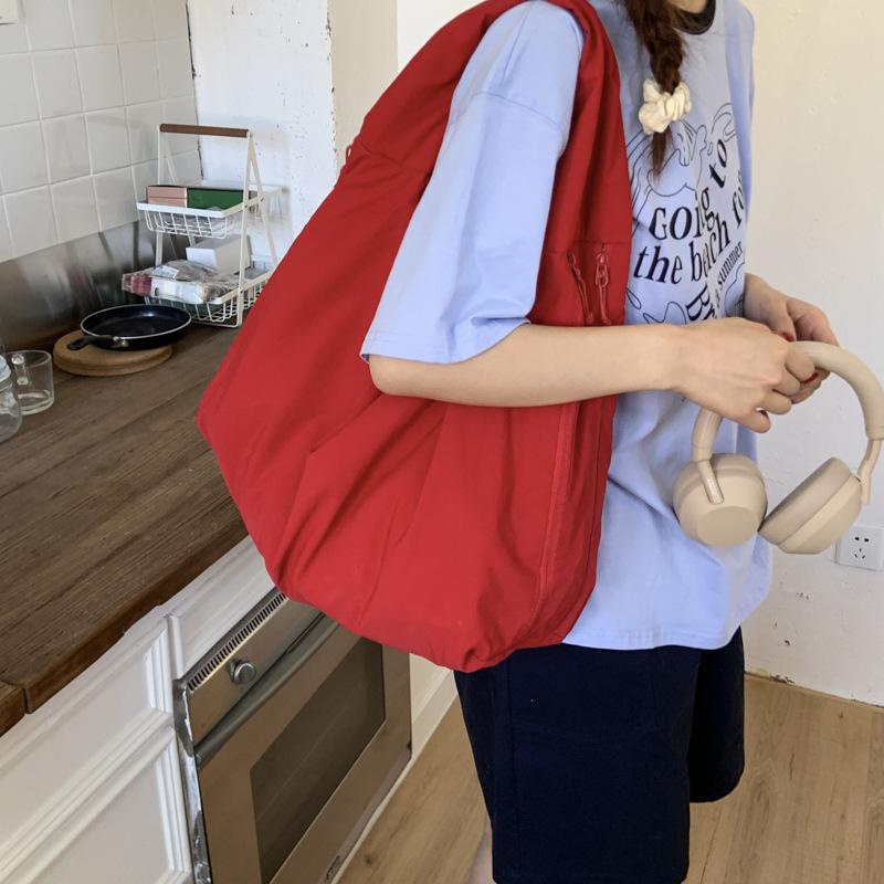 Autumn and winter versatile commuter shoulder bag women's large-capacity lazy style casual canvas tote bag new armpit bag