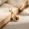 Shiny Wrapped Hollow Tiger Eye Earrings New Chinese Style Luxury Vintage Ear Jewelry For Women