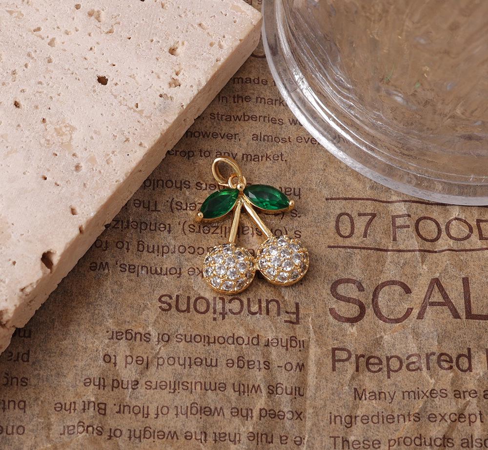 

Sweet Cherry Rhinestone Pendant with Gold and Green Leaves - Light Luxury Clavicle Chain
