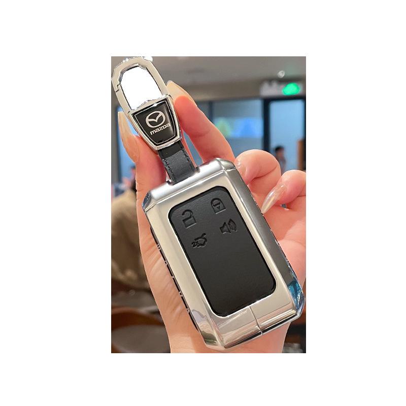 Kuooo: Wear-resistant, fully enclosed Mazda EZ6 key fob and EZ60 car remote protective cases with buckle.