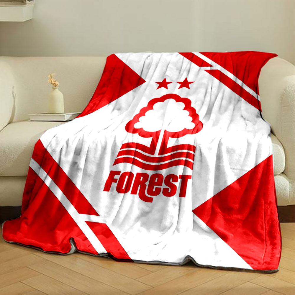 A red tree and wave logo with two stars, framed by geometric red shapes. for all seasons blanket lunch break throw gift