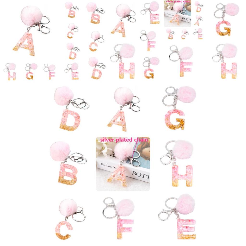 Modischer Schlüsselanhänger mit Plüschball und englischen Buchstaben Kreatives Autozubehör