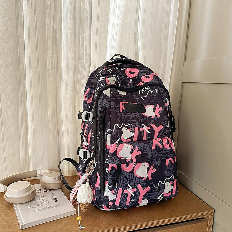 Backpack female junior high school college students high value new large capacity graffiti design sense backpack female