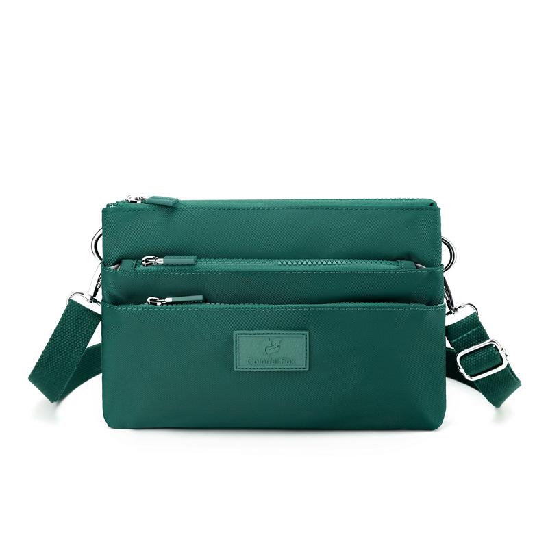 Crossbody bag women's large-capacity multi-layer shoulder bag simple versatile anti-splashing bag