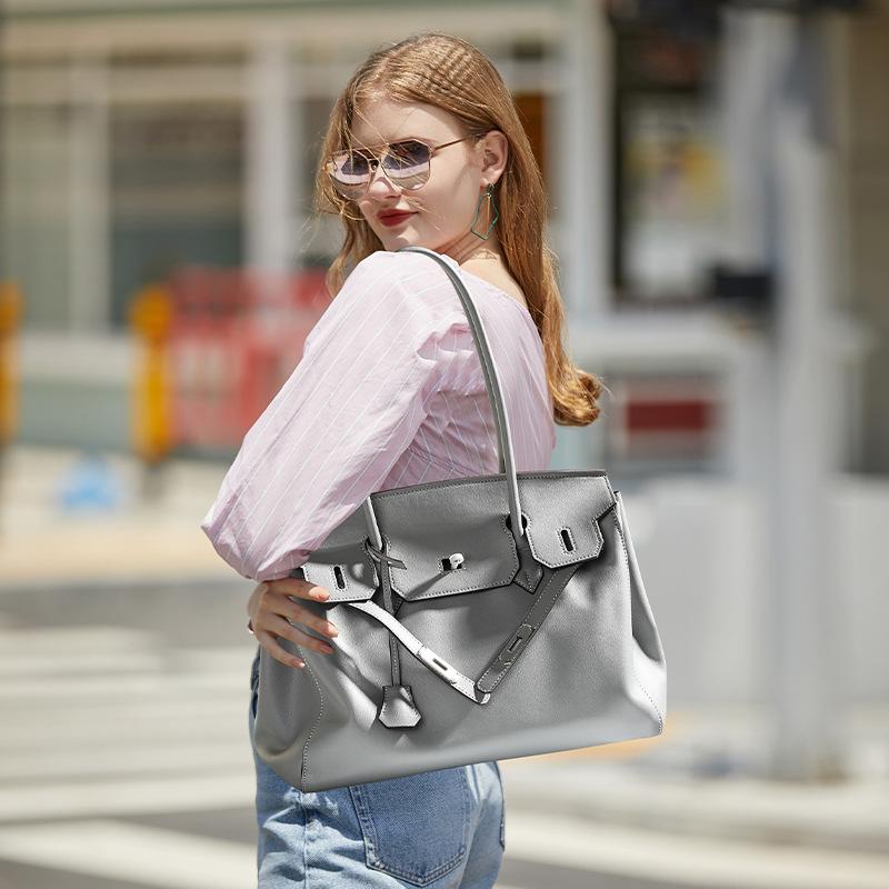 Platinum bag cowhide women's tote bag niche, genuine leather women's large-capacity high-end shoulder bag.