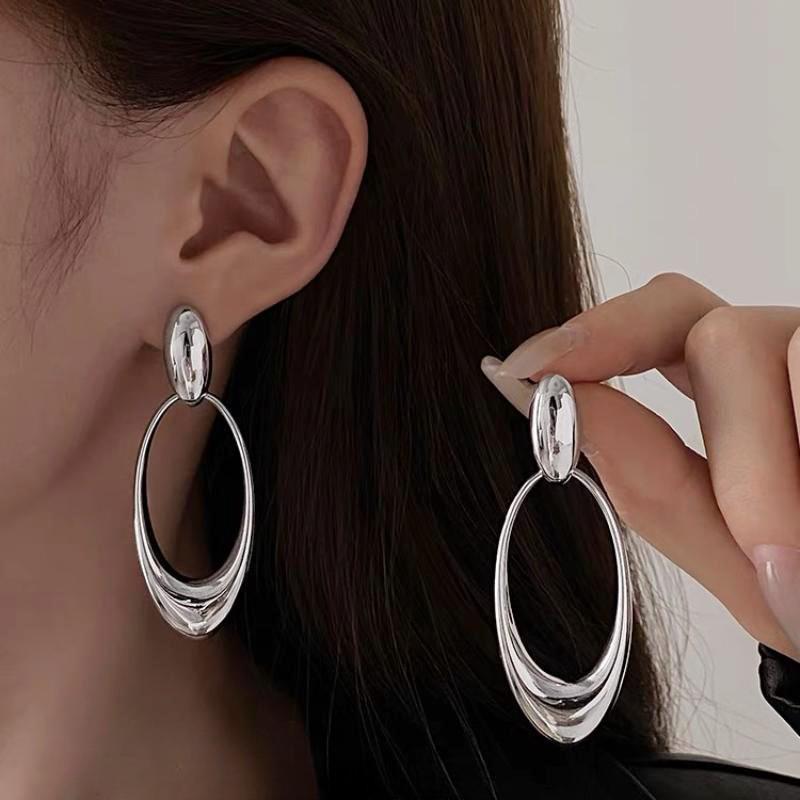 Hongyan S925 Sterling Silver Oval Face-Slimming Earrings: 2024 Korean Fashion Heavy Industry Style.