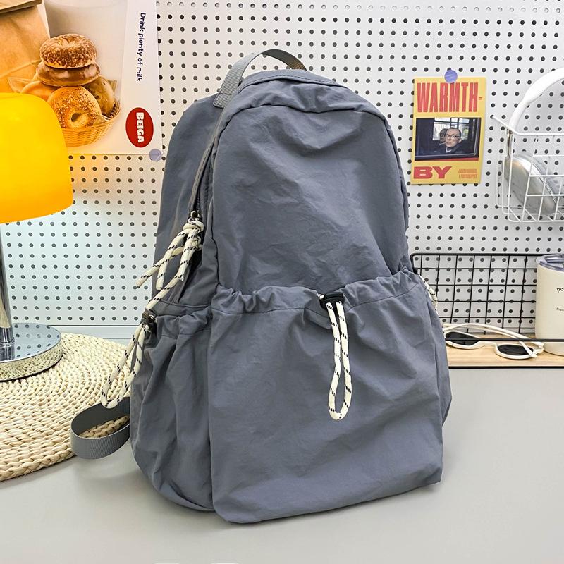 Schoolbag Solid Color Nylon Backpack Women's 1011 Summer New Large Capacity Middle and High School Student School Bag Lightweight Travel Bag