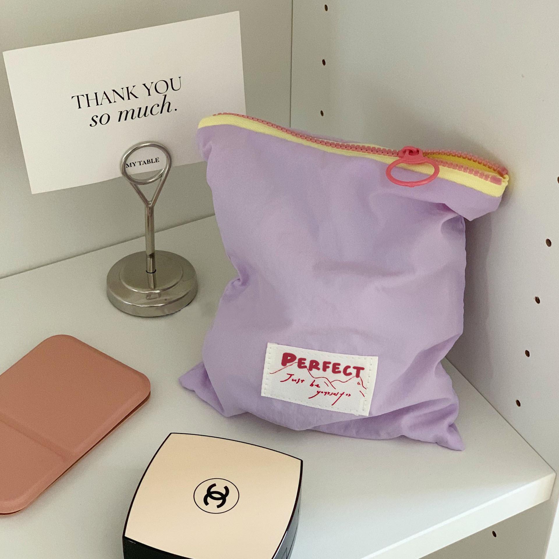 

Portable Waterproof Macaron Travel Makeup Bag for Earphones & Cables