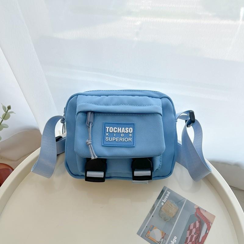 

Trendy Mini Nylon Crossbody Bag For Kids And Adults Featuring Cute Cartoon Design синий
