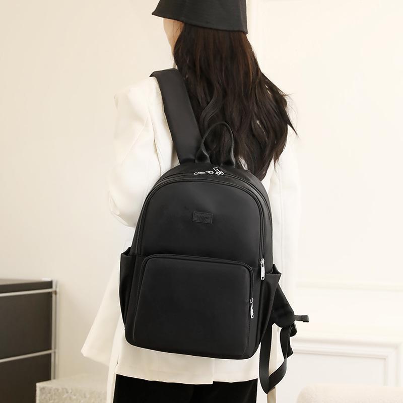 Schoolbag backpack women's European and American style nylon cloth leisure travel schoolbag 1011 new large capacity simple backpack women
