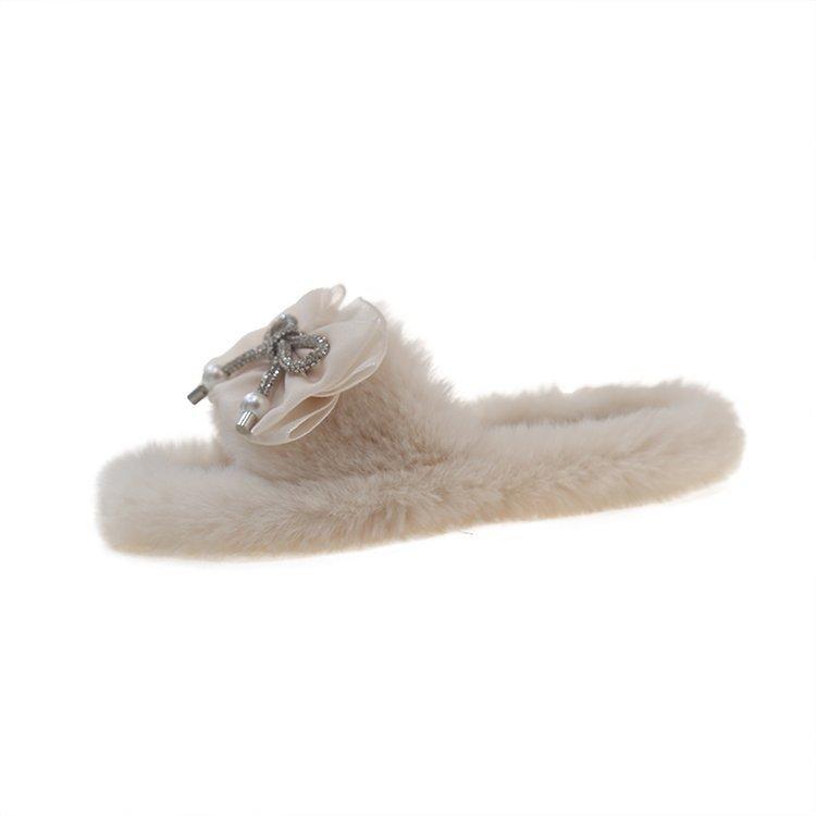 

Sweet rhinestone bow hairy drag girl 2025 autumn and winter thick-bottomed one-word open-toed cotton slippers soft-soled outer wear 40
