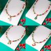 Christmas Themed Bead Necklace Featuring Santa Pendant Festive Color Jewelry For Holiday Gatherings And Outfit Styling