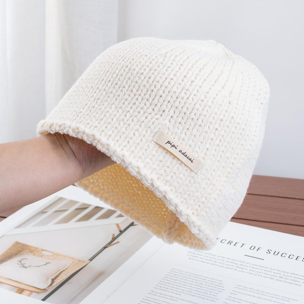 Simple solid color knitted bag head stacking hat women's early autumn new plain and versatile big head circumference showing face small wool hat