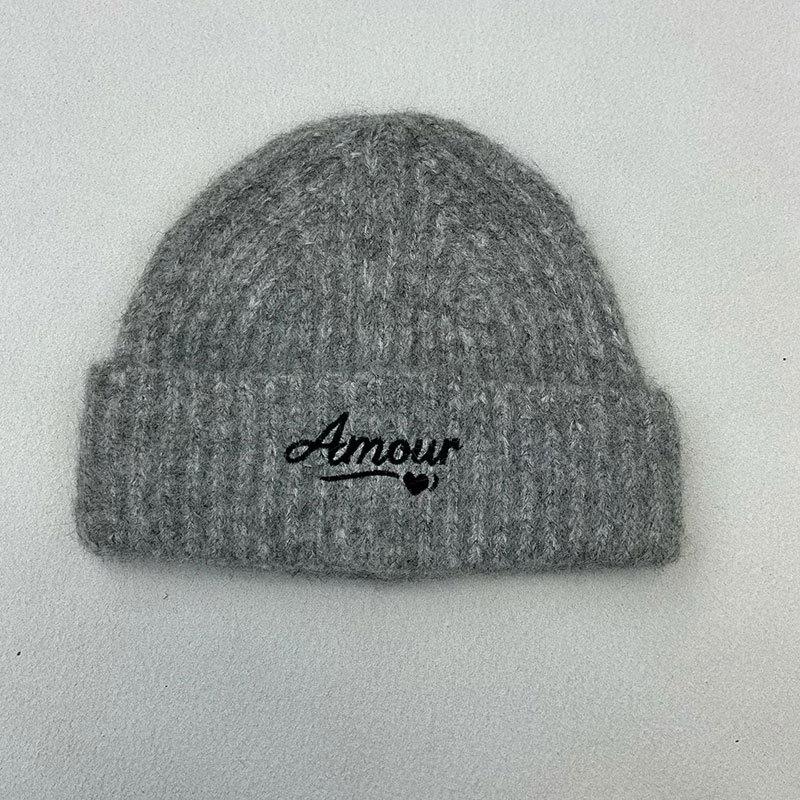 Autumn and winter original new letter embroidery knitted hat to keep warm and show the face, small ear protectors and versatile wool hat