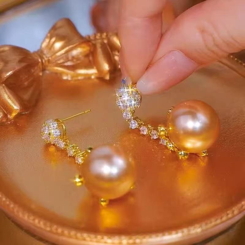 Korean version champagne pearl earrings, snowflake earrings, long temperament, high-end light luxury earrings, earrings.