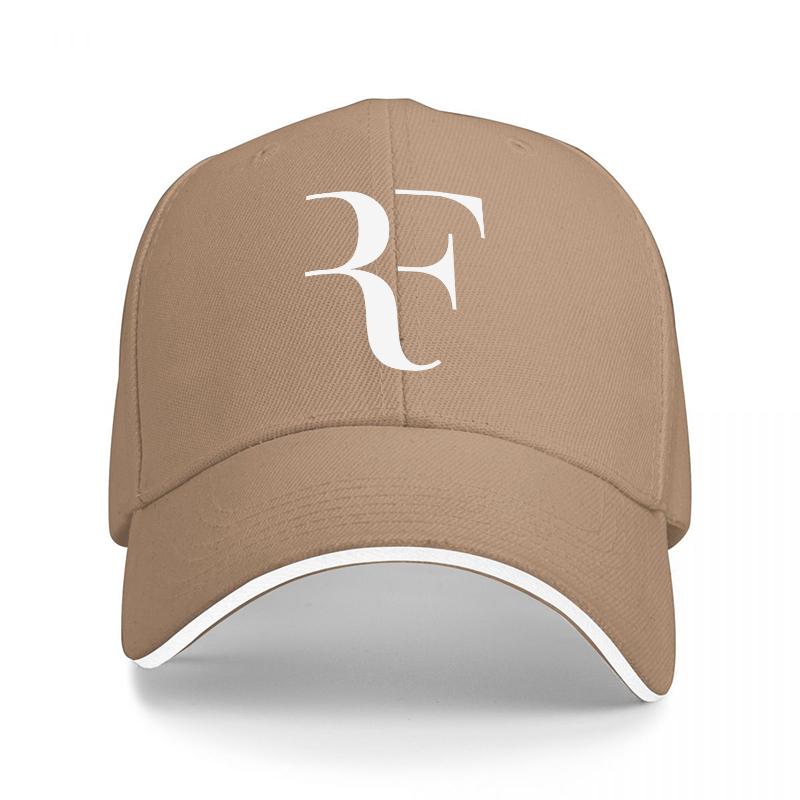 Svart basebollkeps med RF-logotyp och vita detaljer, klassisk design för unisex och kvinnor, modern streetwear-accessoar