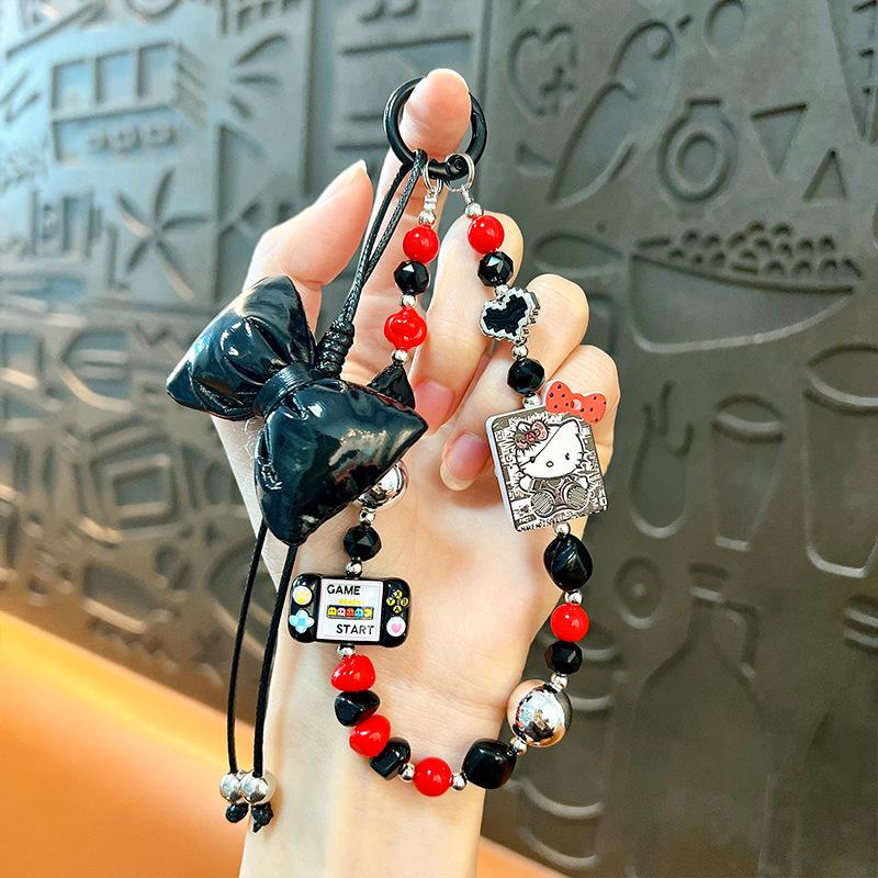 Creative new cat bow beaded mobile phone chain keychain exquisite cute bag pendant small gift wholesale