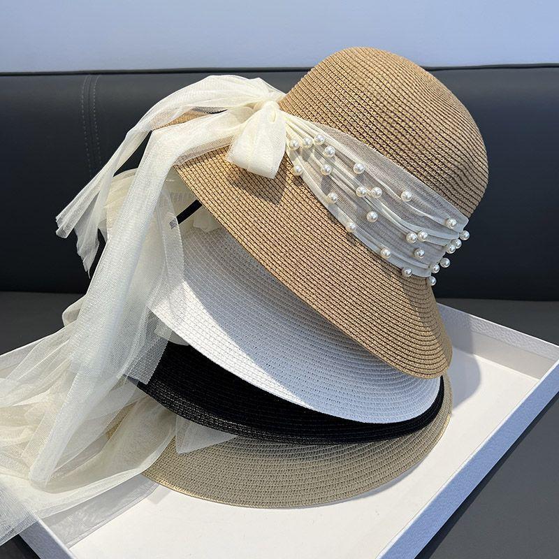 Summer elegant straw woven pearl mesh sunshade straw hat female bow French sunscreen hat seaside bucket hat basin hat